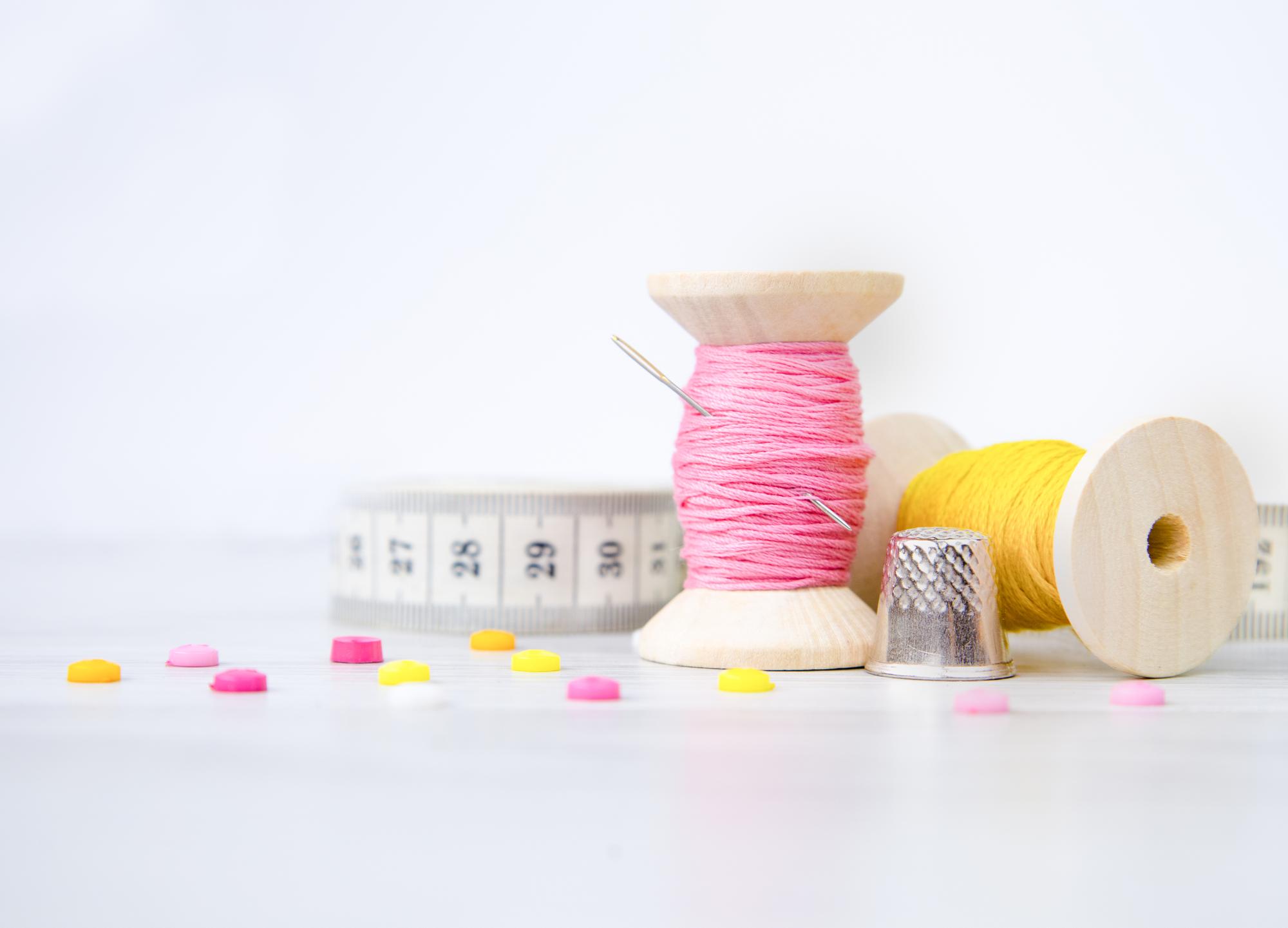 atelier workspace with hoop, threads and pattern